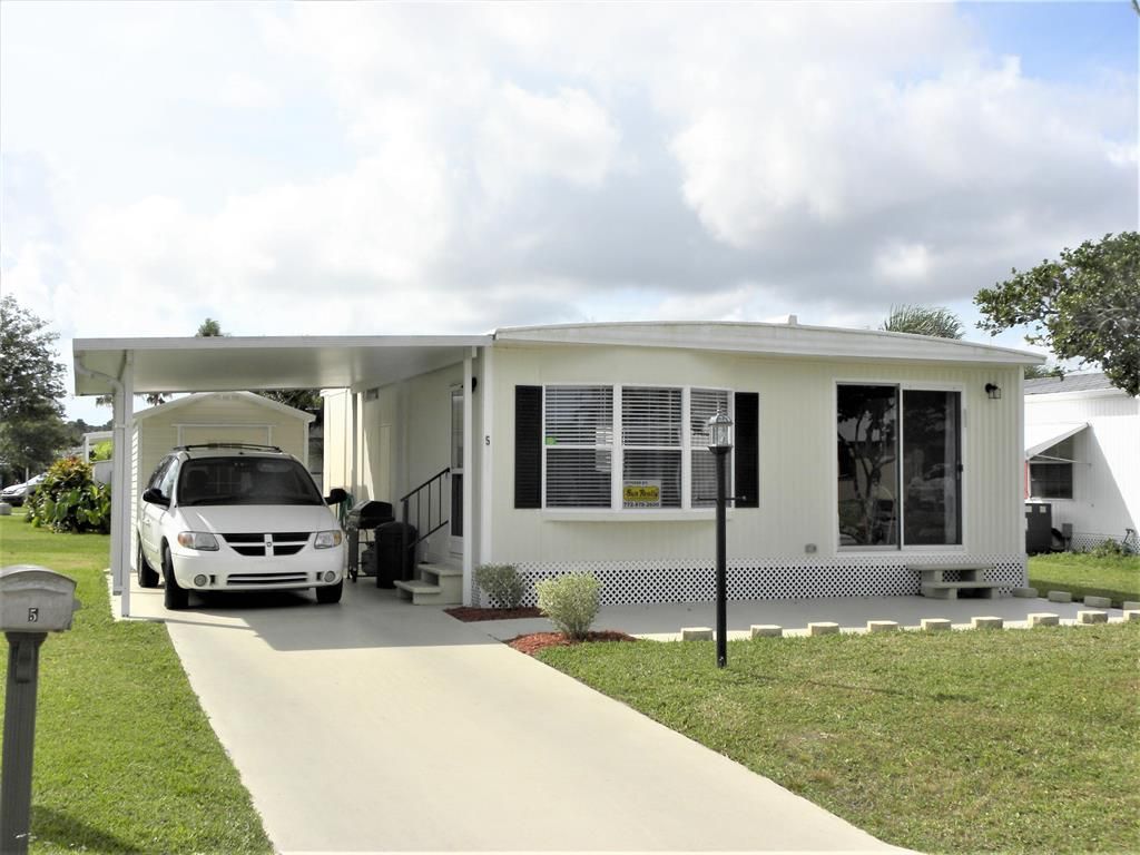 Photo of 5 Universidad Ln, Port Saint Lucie, FL 34952 (MLS # R10879976)