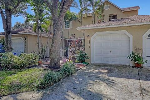 Photo of 2103 MAPLEWOOD Drive, Greenacres, FL 33415 (MLS # B26090663)