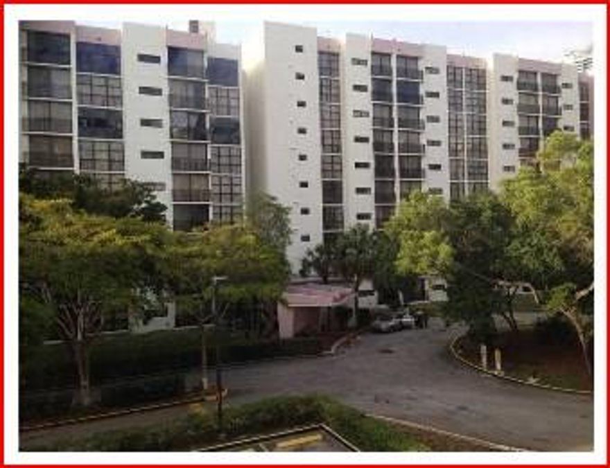 Beautifully renovated 1/1.5 w/ wood floors & tile throughout & balcony overlooking tropical garden areas. Nicely updated kitchen w/ granite tops & new stainless steel appliances. Large master bedroom w/ slate bathroom & walk-in California closet. Perfect location in a gated community w/ two covered parking, pool, exercise and low maintenance. Walking distance to dining & shopping while the beach is right across the street.