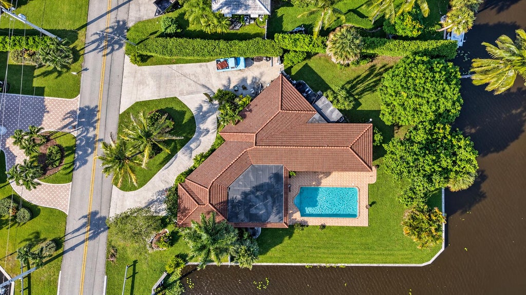 Photo of 7438 Pine Tree Lane, West Palm Beach, FL 33406 (MLS # B26089122)