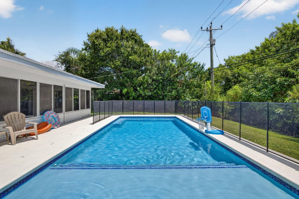 Photo of 2409 NW Everglades Boulevard, Stuart, FL 34994 (MLS # B26051839)