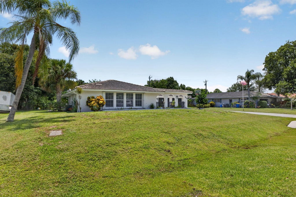 Photo of 2409 NW Everglades Boulevard, Stuart, FL 34994 (MLS # B26051839)