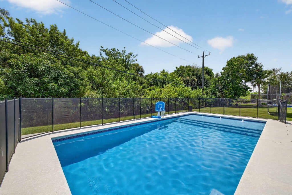 Photo of 2409 NW Everglades Boulevard, Stuart, FL 34994 (MLS # B26051839)