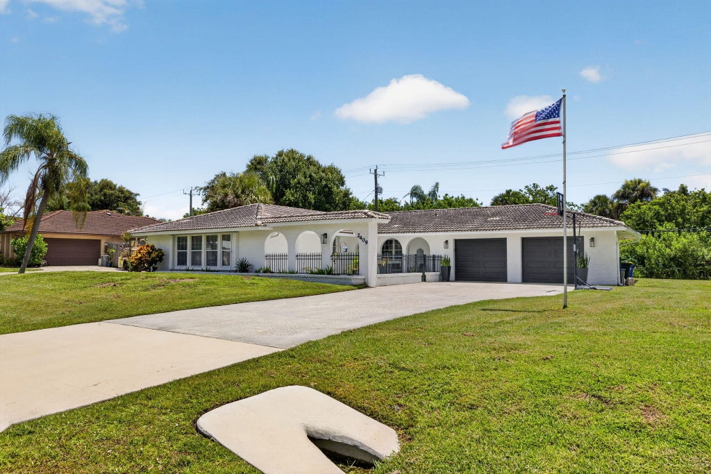Photo of 2409 NW Everglades Boulevard, Stuart, FL 34994 (MLS # B26051839)