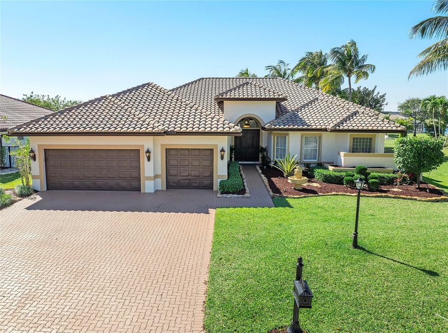 Spacious 5 bedroom, 3.5 bath one-story pool home w/ amazing water views & 3 car garage in The Landings!  Beautifully landscaped home w/ large yard on cul-de-sac.  Gourmet kitchen w/stainless steel appliances, upgraded quartz tops, insta-hot faucet & solid wood cabinets.  24” Marble look tile floors on diagonal in main areas & wood laminate floors in bedrooms.  Huge master bedroom w/ sitting area. Open triple split floor plan is one of the largest in the community. Pool w/ spa & screen overlooking large lake w/ stunning sunsets.  Roof replaced 2013. Includes: Volume ceilings, walk in closets w/ built-ins, wood burn fireplace, crown moulding, SONOS in & out surround sound, accordion shutters, built-in office. Low HOA fee includes gate security, tennis, pickle ball, basketball & playground!