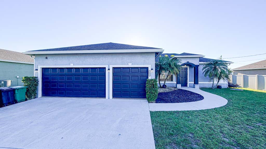 Photo of 4002 SW Jarmer Road, Port Saint Lucie, FL 34953 (MLS # B26062111)
