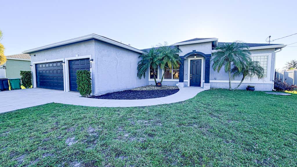 Photo of 4002 SW Jarmer Road, Port Saint Lucie, FL 34953 (MLS # B26062111)