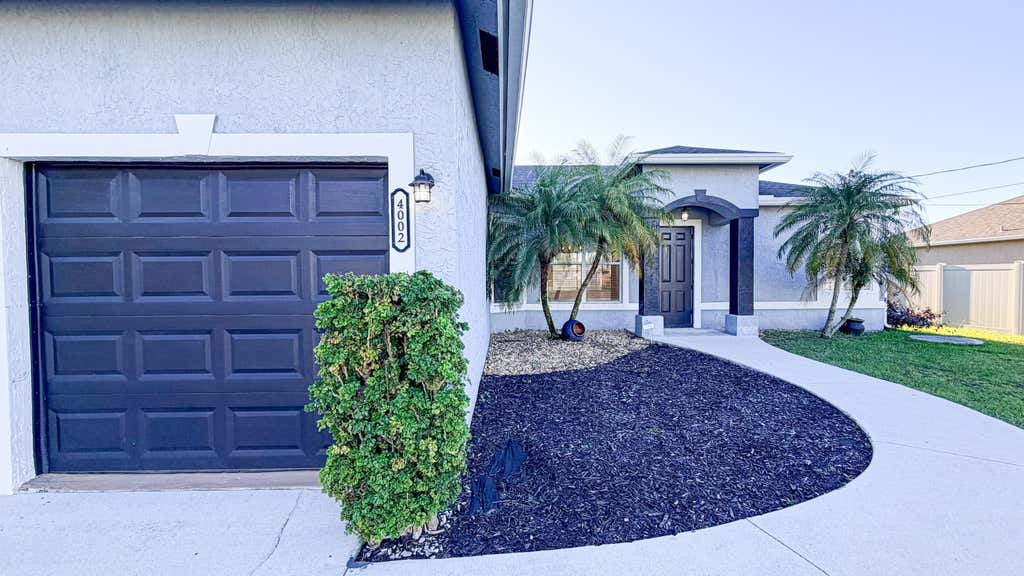 Photo of 4002 SW Jarmer Road, Port Saint Lucie, FL 34953 (MLS # B26062111)