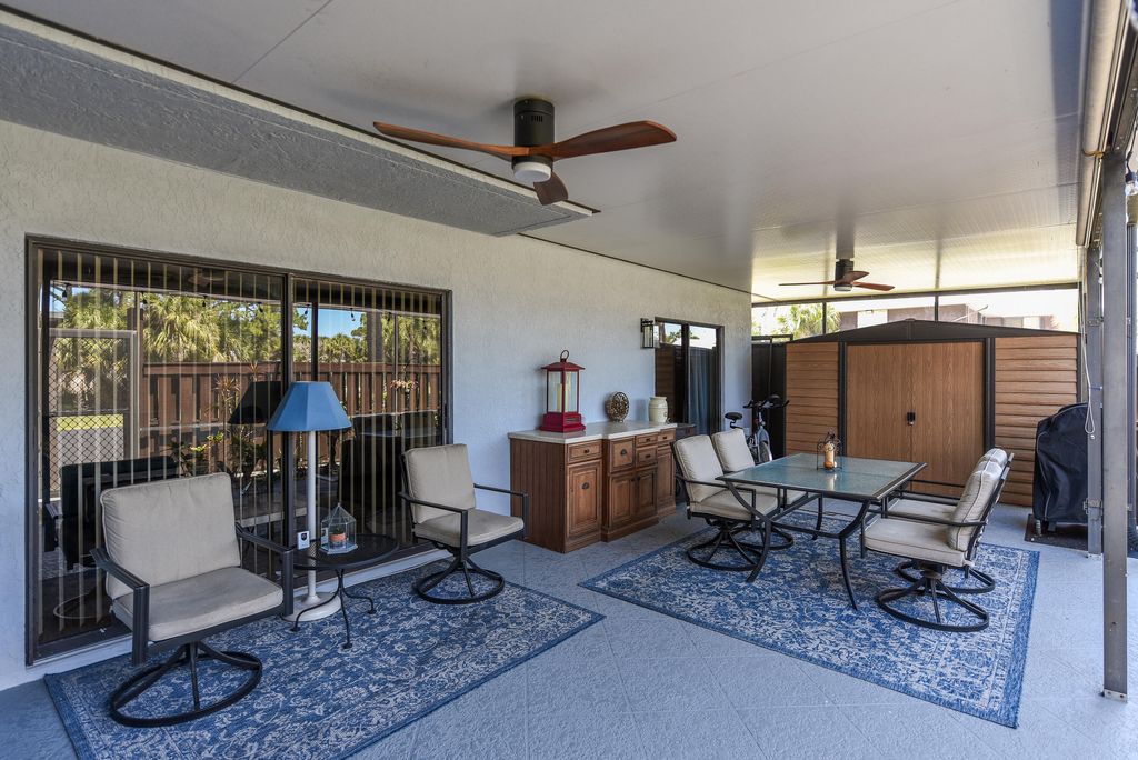 Photo of 3403 SE Guenevere Lane #C, Port Saint Lucie, FL 34952 (MLS # B26021634)