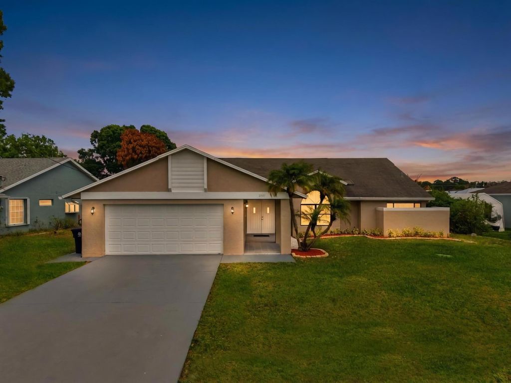 Photo of 2151 SE Bowie Street, Port Saint Lucie, FL 34952 (MLS # B26022542)