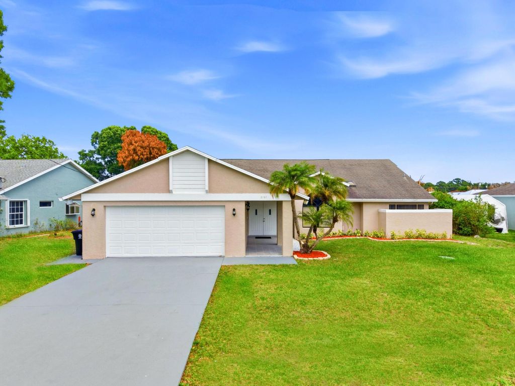 Photo of 2151 SE Bowie Street, Port Saint Lucie, FL 34952 (MLS # B26022542)