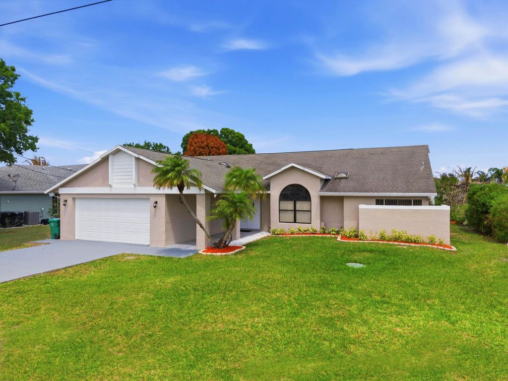 Photo of 2151 SE Bowie Street, Port Saint Lucie, FL 34952 (MLS # B26022542)