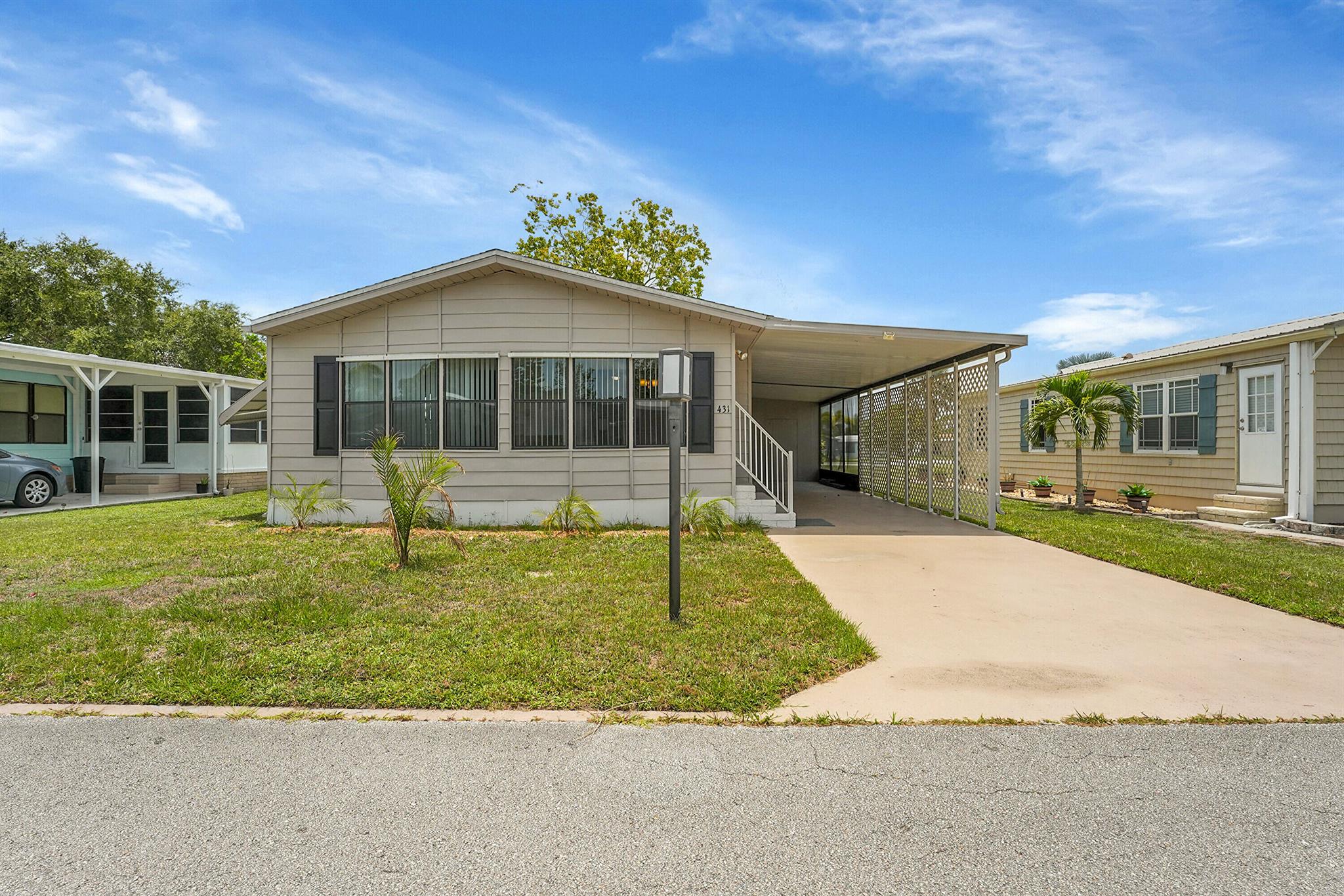 La Buona Vita is a 55+ desirable Community in Port St. Lucie. This 2-bedroom, 2-bath home features a storage shed and carport parking. Laminate floors throughout, newer roof. LOW HOA of $197 a month includes basic cable/Wifi and trash removal, clubhouse with activities and amenities, heated pool, maintenance of common grounds, and on-site management. NO LOT RENT, Boat and RV storage available. Close to shopping, restaurants, and medical facilities. New ac unit.