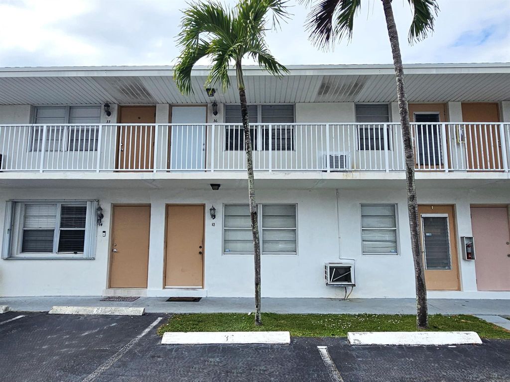 Photo of 810 Lake Shore Drive #14, Lake Park, FL 33403 (MLS # R11144908)