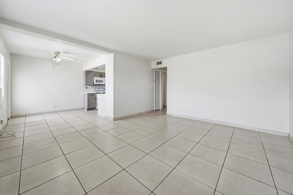 Photo of 810 Lake Shore Drive #14, Lake Park, FL 33403 (MLS # R11144908)