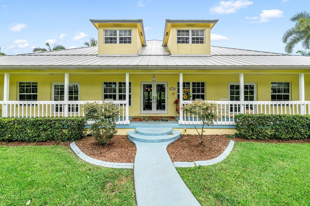 Photo of 14423 Draft Horse Lane, Wellington, FL 33414 (MLS # B26054198)
