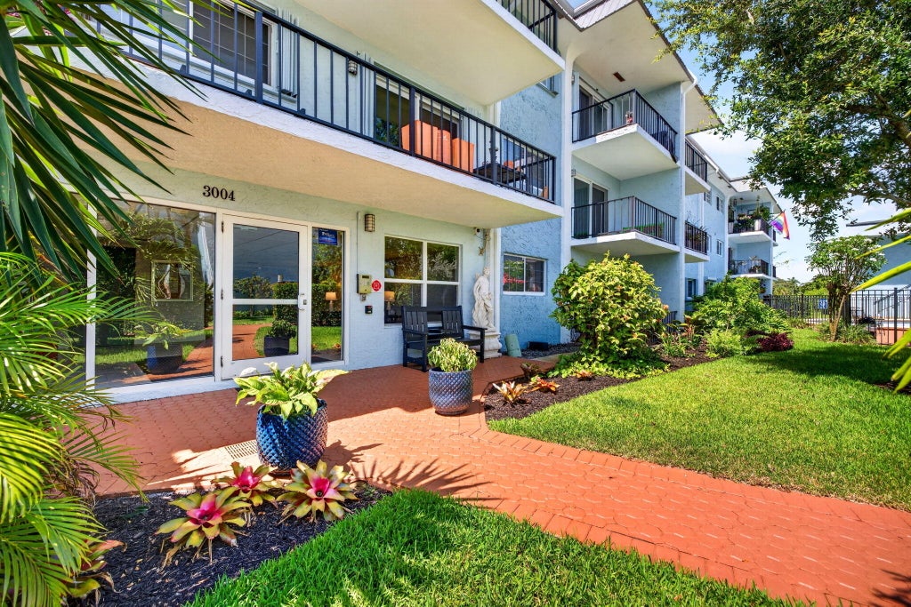 Photo of 3004 NE 5TH Terrace #216-C, Wilton Manors, FL 33334 (MLS # B26057976)