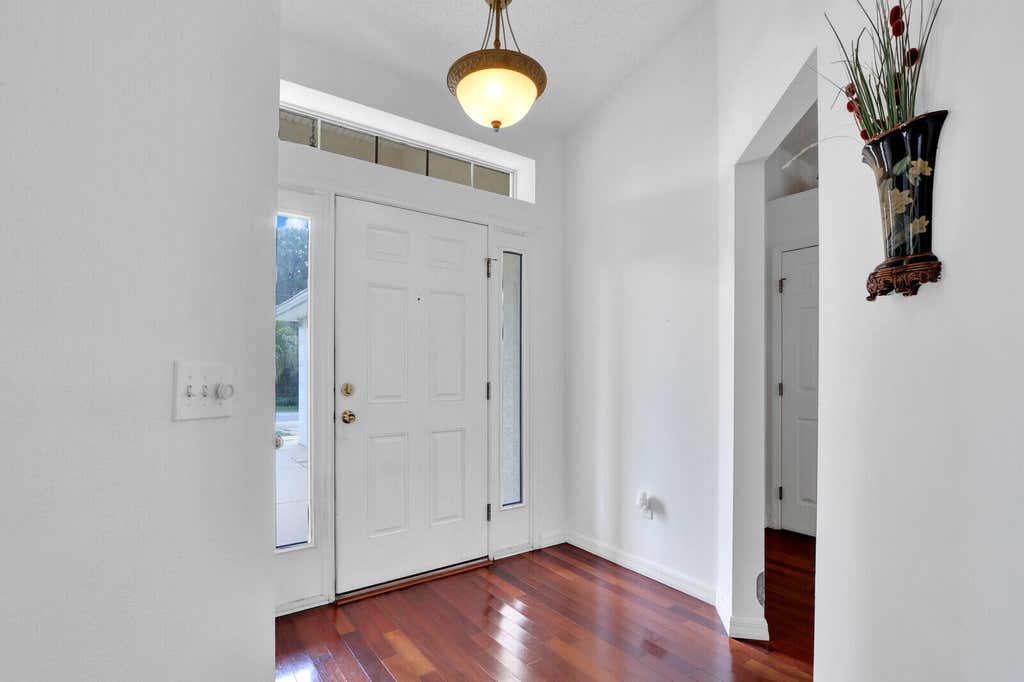 Photo of 1679 SW Taurus Lane, Port Saint Lucie, FL 34984 (MLS # R10989526)
