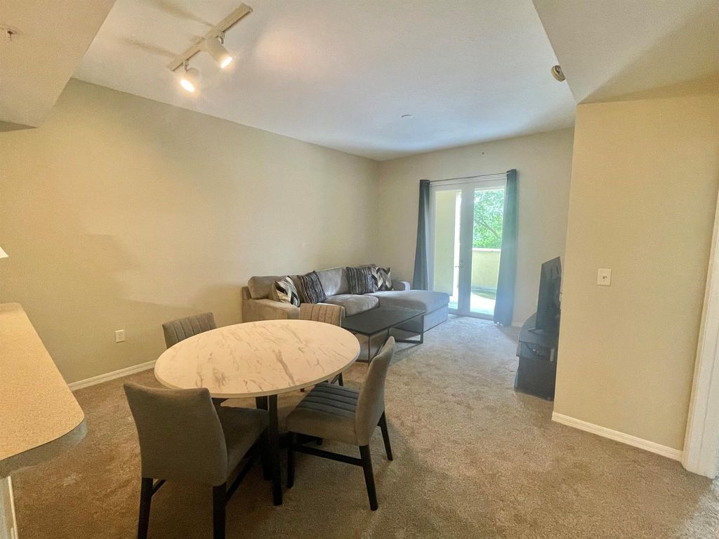 Photo of 1203 Town Center Drive #219, Jupiter, FL 33458 (MLS # R11130409)