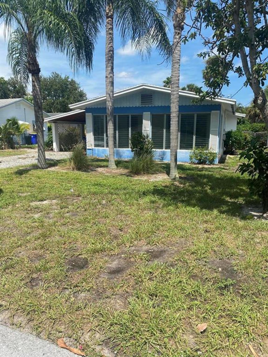 Photo of 1791 NE Mango Terrace, Jensen Beach, FL 34957 (MLS # R10830892)