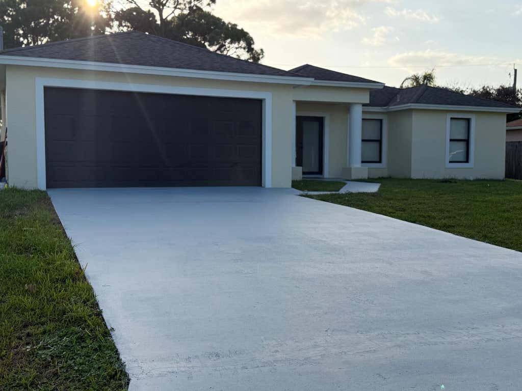 Photo of 1566 SE SUTTON Street, Port Saint Lucie, FL 34983 (MLS # B26065829)