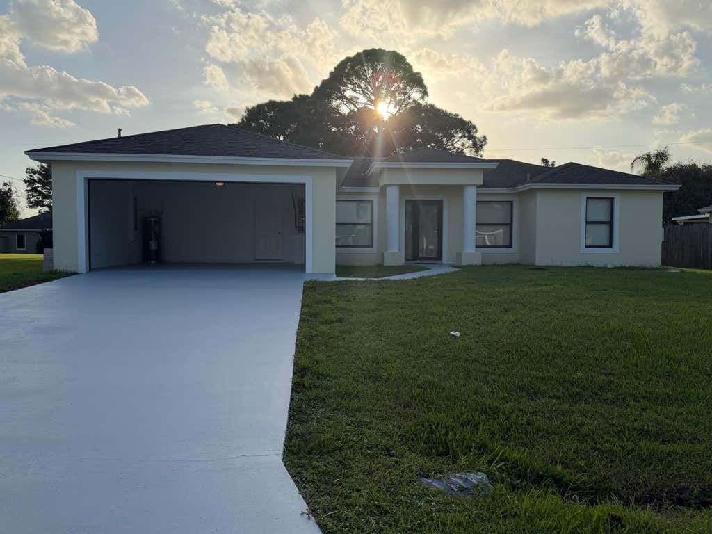 Photo of 1566 SE SUTTON Street, Port Saint Lucie, FL 34983 (MLS # B26065829)