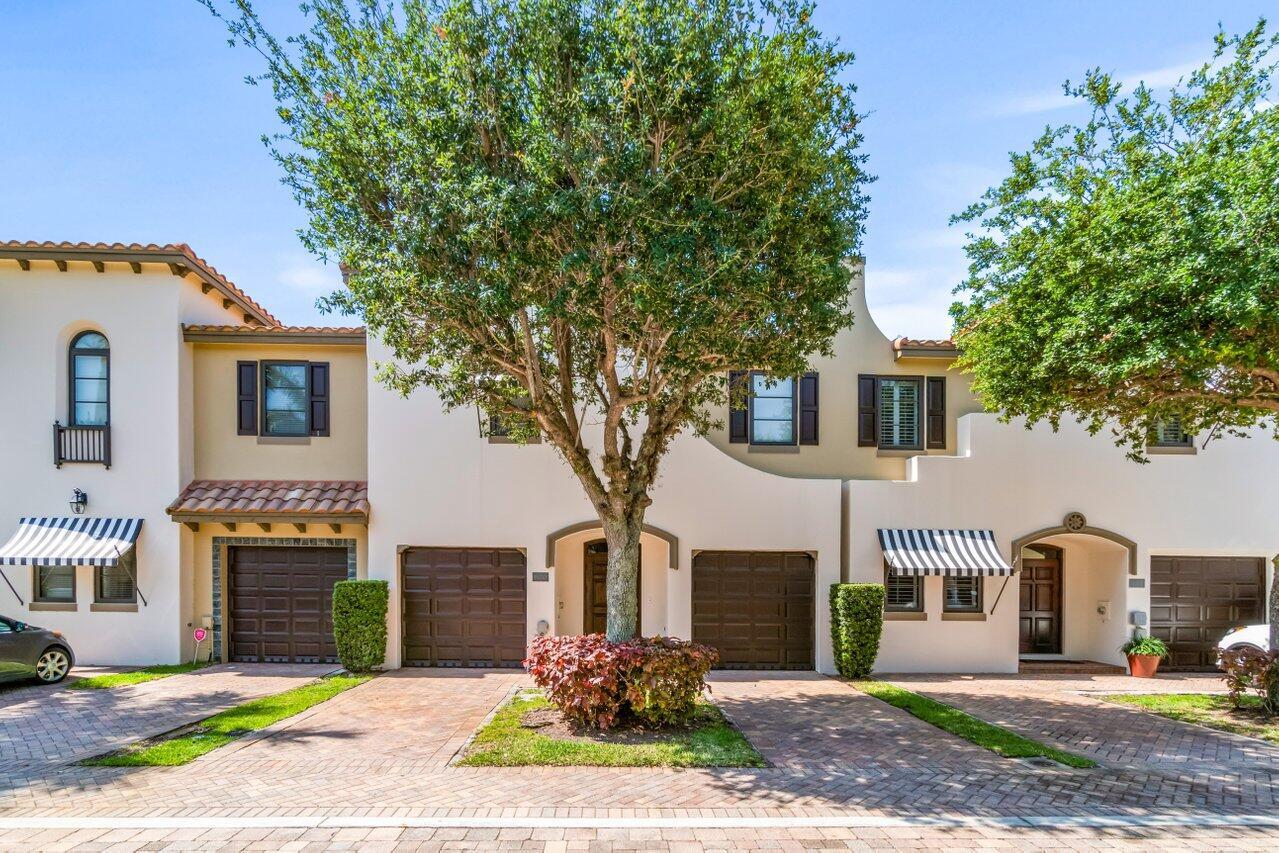 Best Location. The gated intracoastal community of Via Villagio offers this well appointed 3 bedroom townhome, which lives like a single family home. Freshly painted and prepared for you to call home. 3 true bedrooms, 2.5 baths, 1 car garage and 2 car driveway. First level has beautiful marble flooring, spacious kitchen with breakfast area and snack bar, laptop nook and plenty of counter space. Second level conveniently offers laundry room and split bedroom plan. Generously sized primary bedroom has oversized walk-in closet and spa inspired bathroom with dual vanities, separate shower and whirlpool tub. Outdoor rear deck is the perfect place to relax, read, bbq or enjoy the salt air. This community offers a pool overlooking the intracoastal with serene views from its private sandy beach.