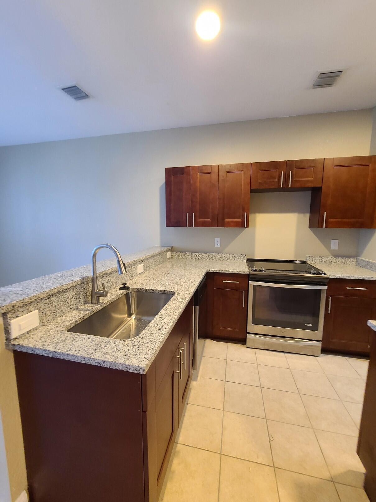 1228 LUCAYA Drive, Riviera Beach, FL, 33404/$269,000 4 1228 LUCAYA Drive