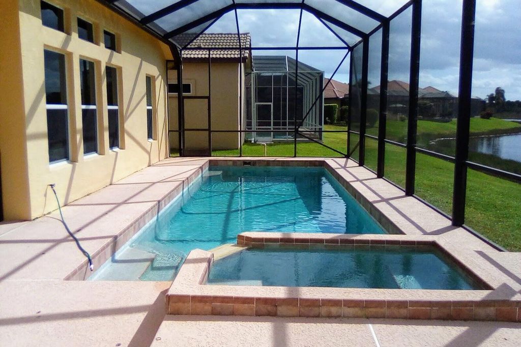 Photo of 895 SW Grand Reserves Boulevard, Saint Lucie West, FL 34986 (MLS # R10928220)