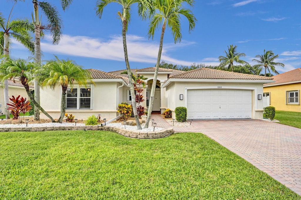 Photo of 5242 Indianwood Village Lane, Lake Worth, FL 33463 (MLS # R11103799)