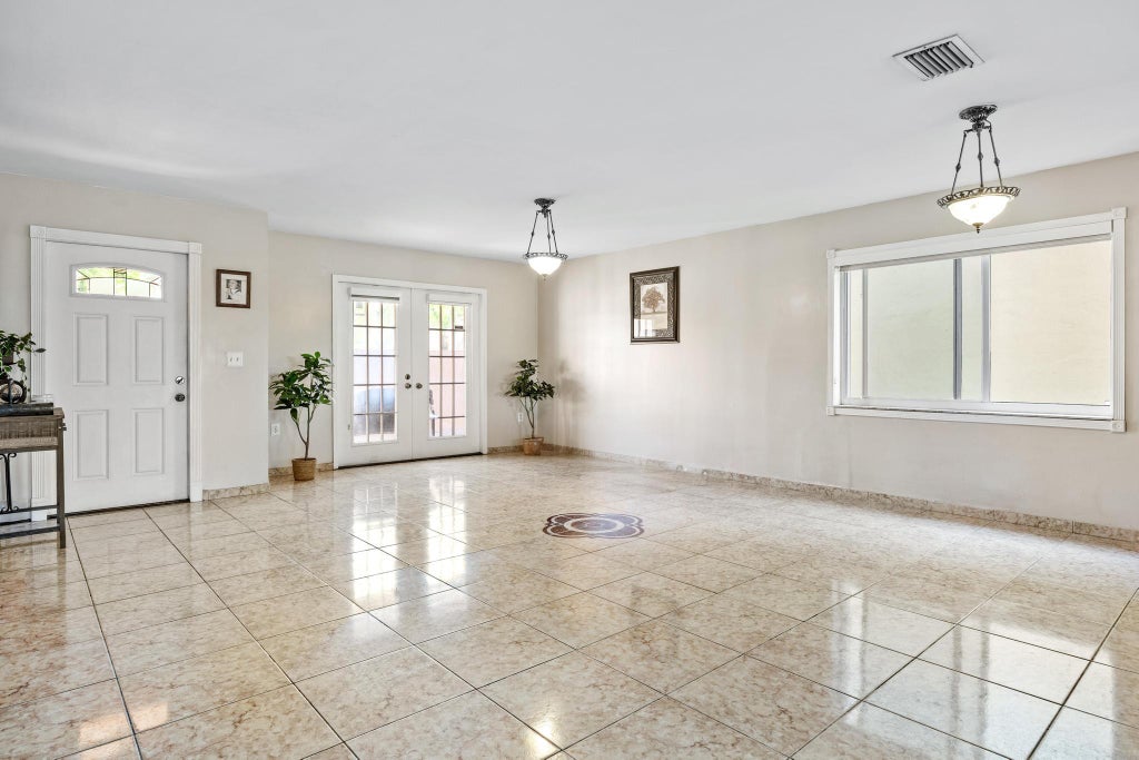 Photo of 940 SW 96TH Avenue, Pembroke Pines, FL 33025 (MLS # B26069619)