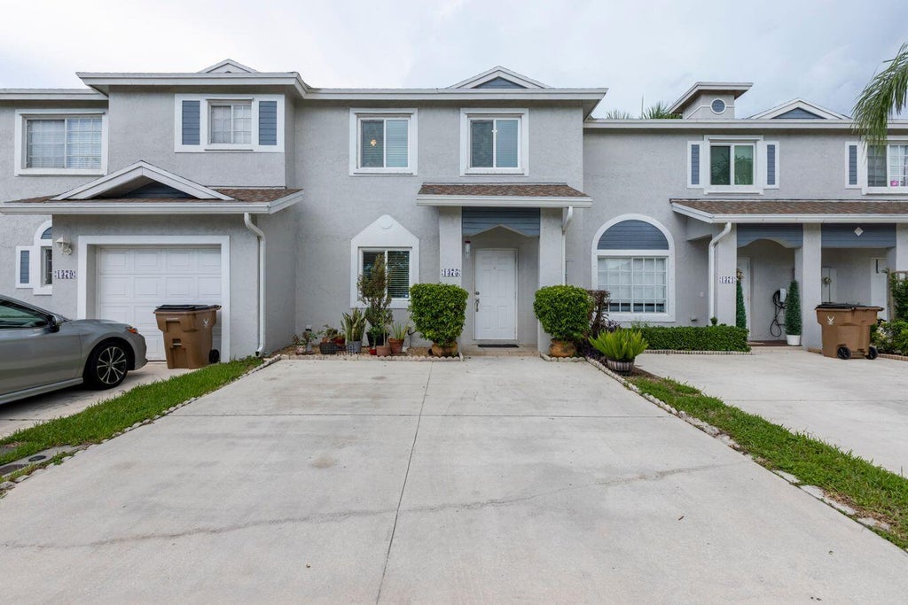 Photo of 1375 SW 48th Terrace, Deerfield Beach, FL 33442 (MLS # B26074833)