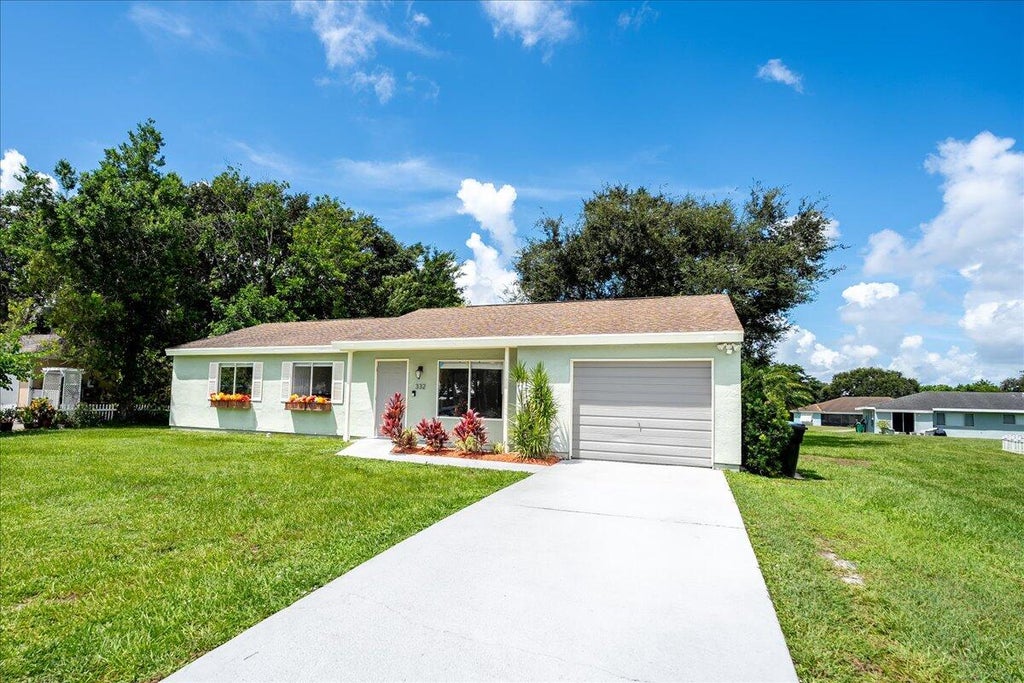 Photo of 332 SW Belmont Circle, Port Saint Lucie, FL 34953 (MLS # R11016260)