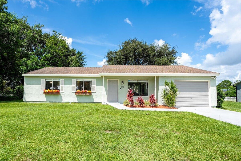 Photo of 332 SW Belmont Circle, Port Saint Lucie, FL 34953 (MLS # R11016260)