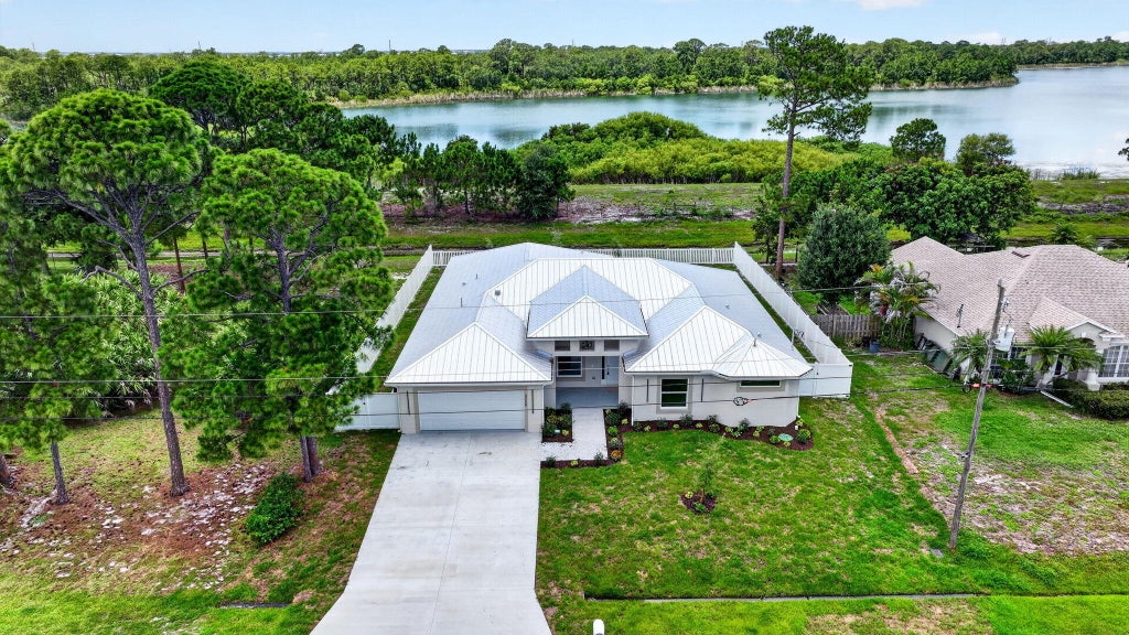 Photo of 3366 SW Esperanto Street, Port Saint Lucie, FL 34953 (MLS # B26041704)