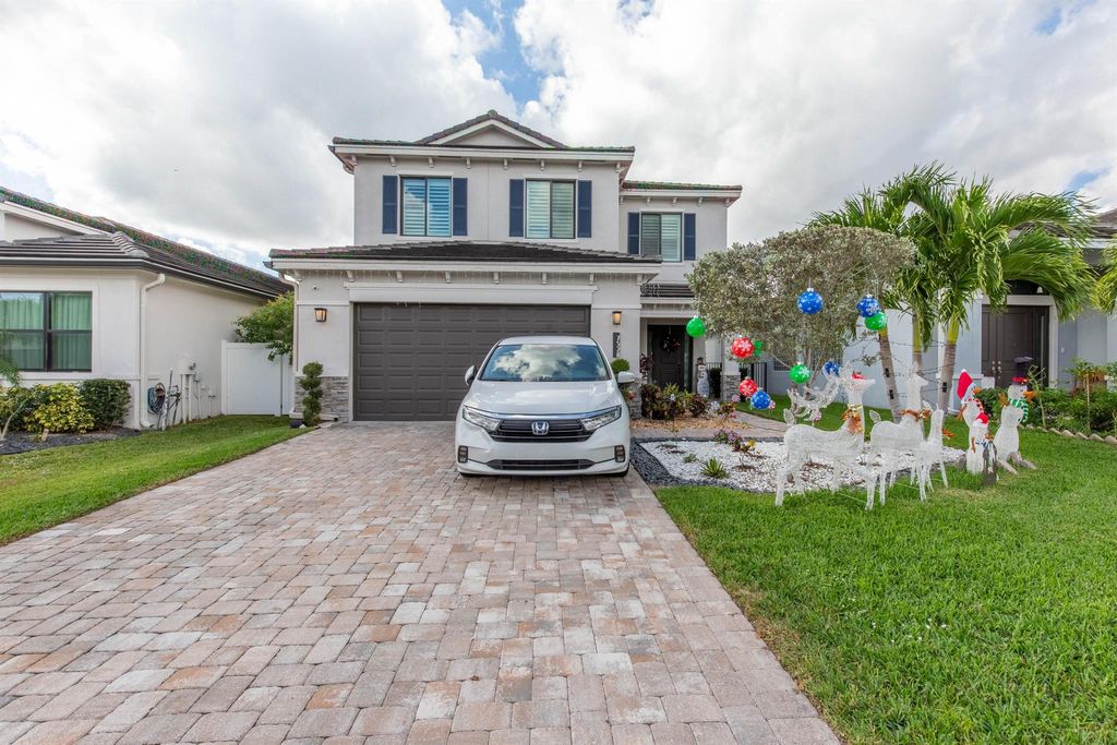 Photo of 7528 Moonrise Drive, Lake Worth, FL 33467 (MLS # R11147201)
