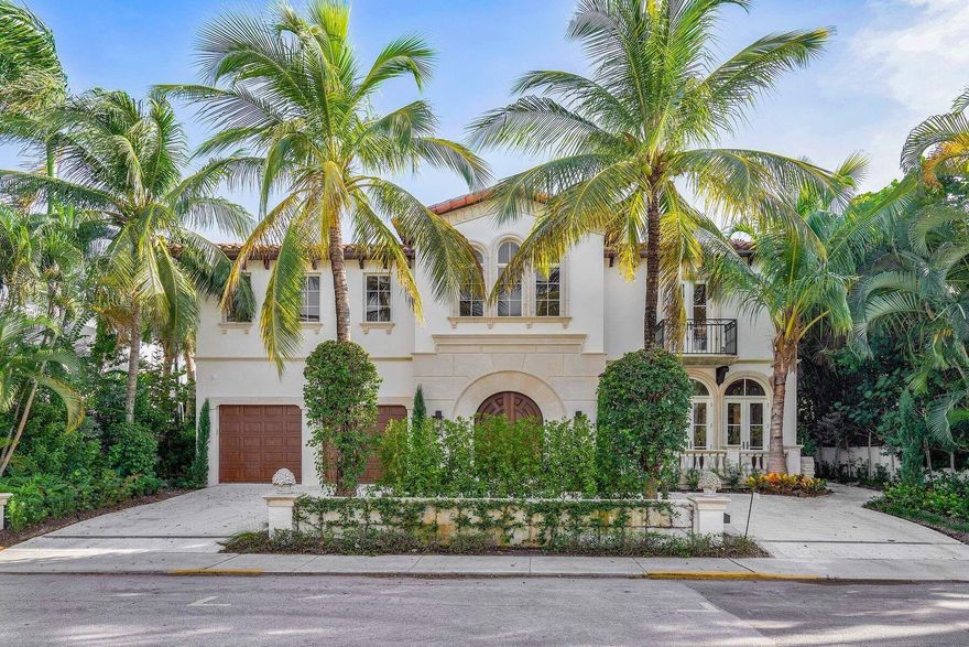 This spacious in-town residence has just undergone an extraordinary two-year renovation. Eleven foot ceilings in the main living spaces capture natural light and highlight the space's pristine contemporary finishes and just-installed wide plank bleached oak floors. A sculptural modern glass railing on the new stairway adds even more sparkle. That kind of careful consideration was applied to every detail-the new kitchen is equipped with top-of-the-line appliances and the primary bathroom is finished like a high end spa. Nothing was left untouched-new bathrooms, new electrical, new AC, new pool terrace and more. A truly stunning finished product and location, location, location. Just one street south of Dunbar and a very short stroll to churches, Publix supermarket, Royal Poinciana Plaza shops and restaurants, the beach and the Lake Trail.
