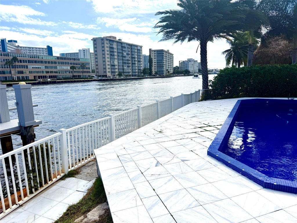 Photo of 720 NE 28TH Avenue, Pompano Beach, FL 33062 (MLS # B26085086)