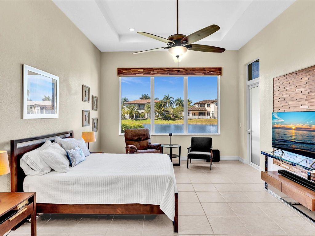 Photo of 7839 NW 112th Way, Parkland, FL 33076 (MLS # F10550282)