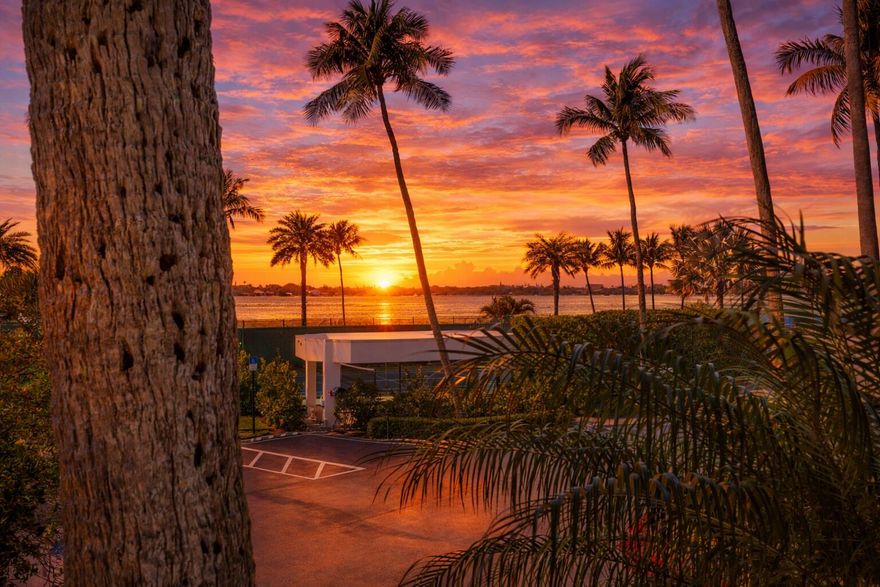 Direct beach access, Intracoastal views, and first-floor living at Carlton Place. This 3BR/3BA corner residence offers 2,533 SF in one of Palm Beach's premier oceanfront buildings. Southwest exposure provides natural light while capturing serene Intracoastal views and sunset skies. The wraparound terrace extends the living space for seamless indoor-outdoor living. Spacious living and dining areas and an eat-in kitchen are maintained in well-kept condition with select updates, offering the option to enjoy as-is or redesign. Carlton Place offers a 24/7 manned gate, doorman, 2 garage parking spaces, fitness center, social room, tennis, pickleball, resort-style pool, summer kitchen, private beach pavilion, and beach access. Impact windows paid, pending installation. Minutes to PBI.