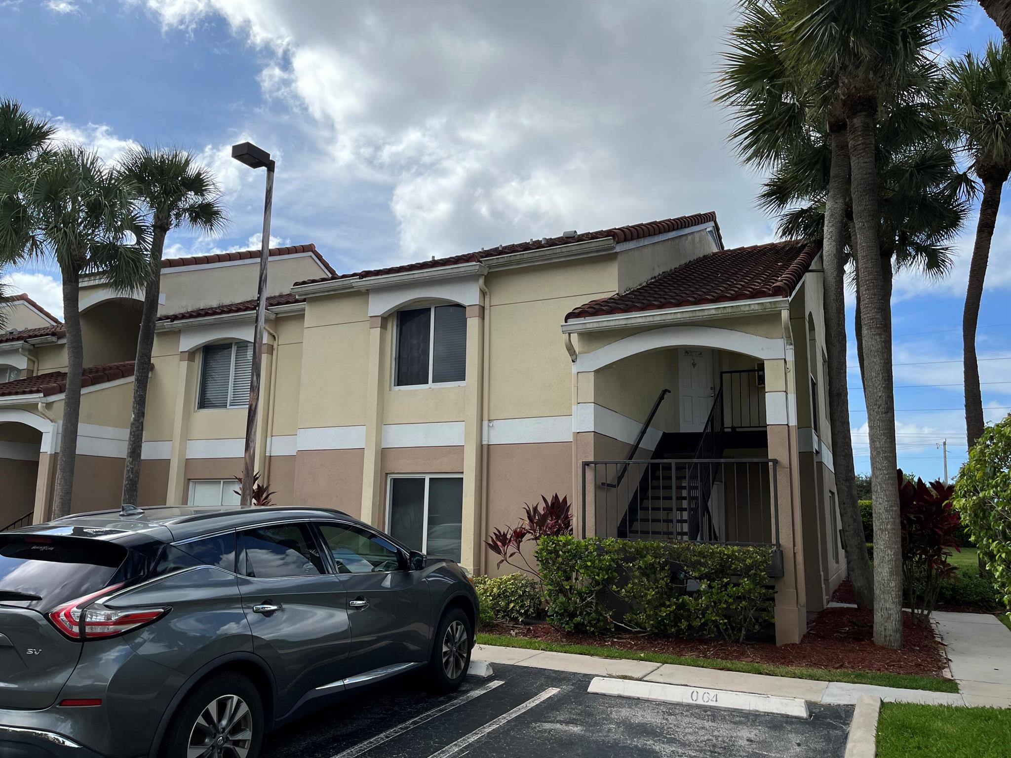 Beautifully updated 2/2 condo with gorgeous water view. Large screened patio overlooking the lake. Granite & Stainless kitchen! Laminate flooring and tile throughout. Updated Baths. This unit is ready to move in.