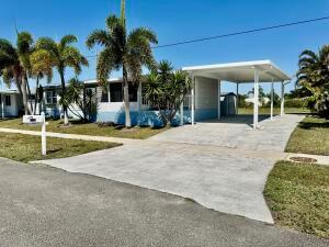 Well maintained manufactured home in active age 55+ community, preferred waterfront lot on canal, nice privacy and peacefulness, no immediate rear neighbor, tranquil views with covered patio to relax in, enclosed Florida room entry, open kitchen for entertaining, many recent upgrades including all newer appliances, metal roof, you OWN the land, no lot lease fees! 1 time land share fee $750 refundable at resale, carport. Most desired complex in Palm Beach County, heated pool just refinished, clubhouse activities includes free happy hours, concerts, holiday parties, shuffleboard courts, bocce, petanque golf drive cage , pets, golf carts, & motorcycle ok, great for snowbirds or full time resident, incredible opportunity to own your FL dream vacation home, close to airport, 5 miles to beac