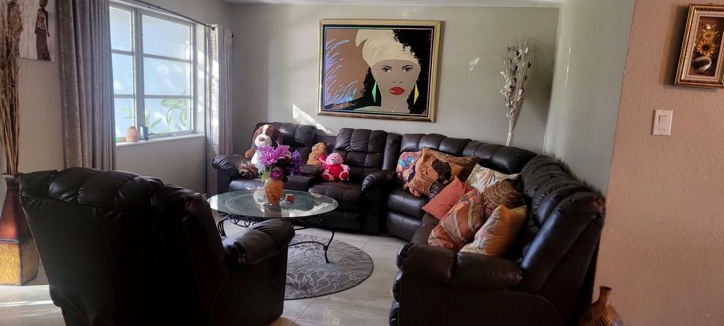 Photo of 2350 NW 60th Ave, Sunrise, FL 33313 (MLS # F10538290)