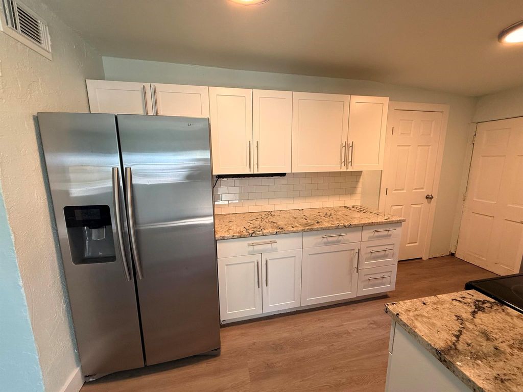 Photo of 508 Palmetto Street, West Palm Beach, FL 33405 (MLS # R11126465)