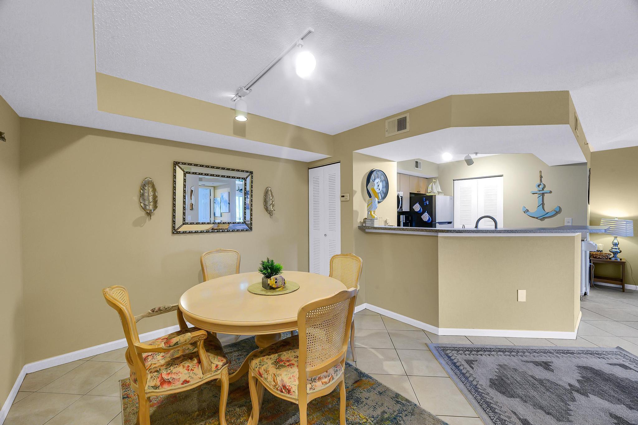 Welcome to COSTAL PARADISE! Beautiful, sparkling clean UNFURNISHED or FULLY FURNISHED ( offered @ $100 extra per month) ,1 BEDROOM condo in Jensen Beach . This pristine CORNER unit offers awesome LAKE VIEWS and both privacy and functionality. It is only 5 minutes drive to the beach, minutes to shopping, restaurants and night life. This amazing unit offers tranquil living in the heart of Jensen Beach. Featuring porcelain floors throughout, fully equipped kitchen, washer and dryer, walk in closet, SS appliances and screened balcony overlooking the LAKE. RESORT STYLE club house with pool and hot tub, gym, tennis, squash, etc. Landlord will consider small dog pet at an extra pet fee. Available NOW. Application required
