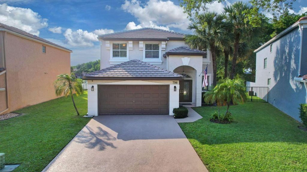 Photo of 7518 Oak Grove Circle, Lake Worth, FL 33467 (MLS # R10975511)