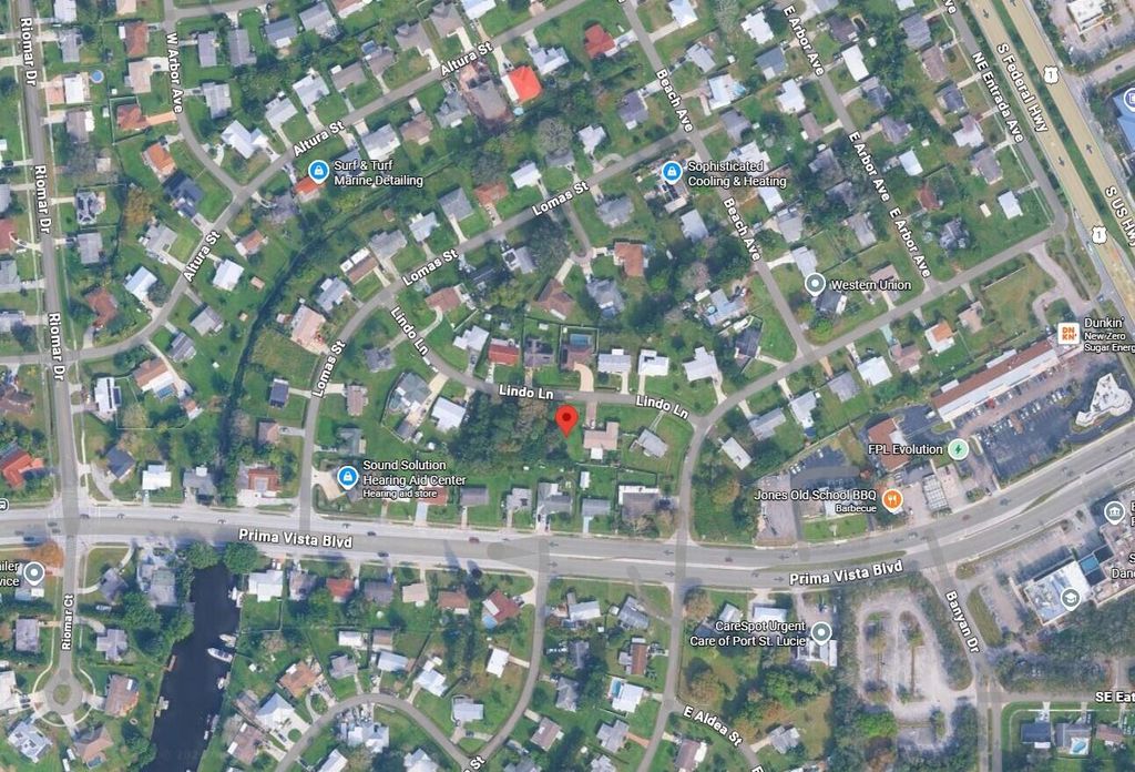 Photo of 770 Lindo Lane, Port Saint Lucie, FL 34952 (MLS # B26010623)