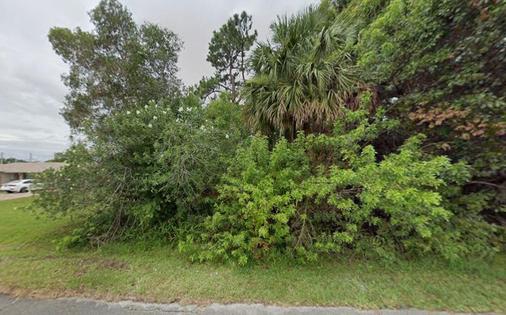 Photo of 770 Lindo Lane, Port Saint Lucie, FL 34952 (MLS # B26010623)