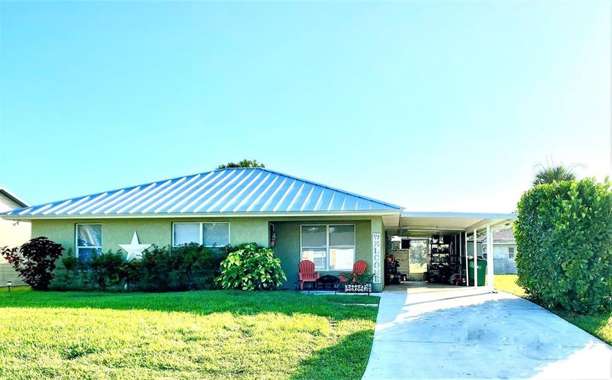 Kings Bay- 3/2/1 car attached carport, CBS home boasting 1,584 sq feet under roof! Located in a well maintained HOA community conveniently located off 441 SE. Ideal for commuters. Low monthly $65 HOA Fee includes access to the community pool, tennis courts, & personal lawn maintenance. Home has solid wood cabinets, updated laminate flooring throughout and an indoor laundry room. Beautiful backyard includes a Mango tree.