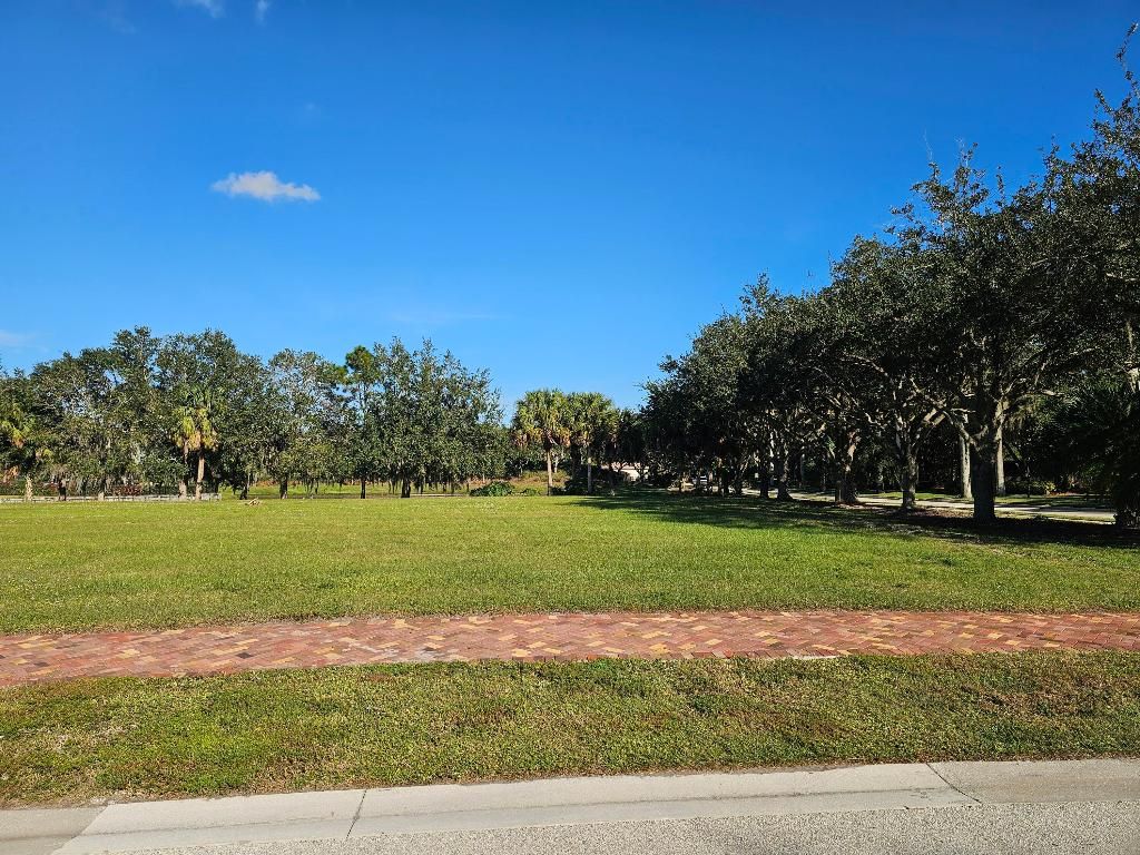 Photo of 102 SE Via Lago Garda, Port Saint Lucie, FL 34952 (MLS # R11142549)
